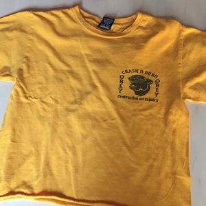 yellowish orange obey shirt